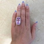 Hand Picture elongated oval cut kunzite center with diamond halo f1 ROC101