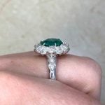 emerald center with diamond halo set in 18k white gold Side Finger f4 ROC102