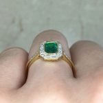 Bezel-Set Emerald Center with diamond halo Basket View f3 15915