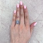 Art Deco Diamond and Sapphire Ring Hand Picture White Backdrop 15976