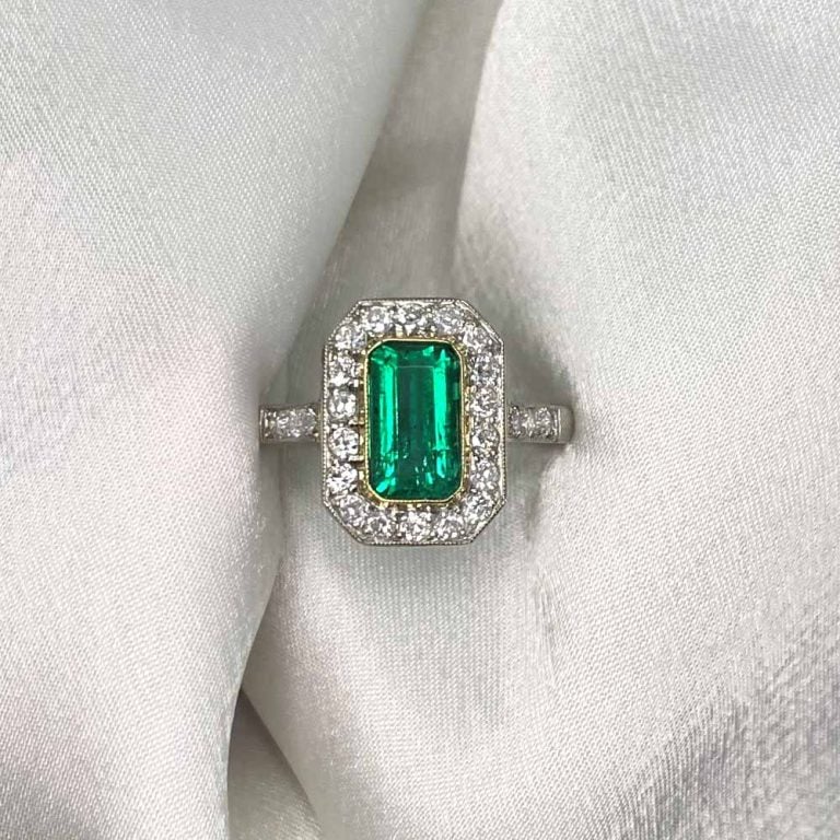 1.43ct Emerald and Diamond Halo Platinum Nordmont Ring
