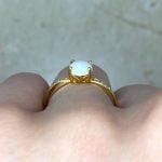 Oval-Cut Opal Center Set in 14k Yellow Gold Basket View f3 15990