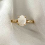 Oval-Cut Opal with Pave-Set diamonds on shoulders White Backdrop f5 15990