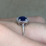 Side Finger View Prong-Set Natural Sapphire Center with Diamond Halo f4 16005