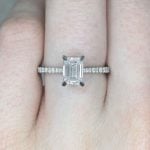 GIA-certified 1.00 carat emerald cut diamond with Diamonds lining shoulders f2 16007
