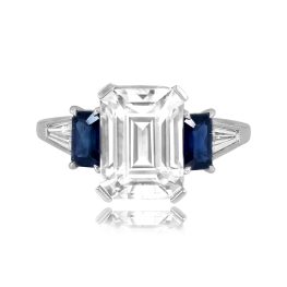 center emerald cut diamond with sapphire and diamond accents Karnack Ring MTG1