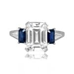 center emerald cut diamond with sapphire and diamond accents Karnack Ring MTG1