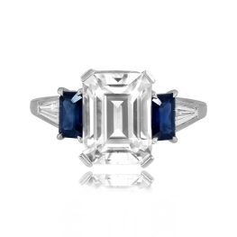 center emerald cut diamond with sapphire and diamond accents Karnack Ring MTG1