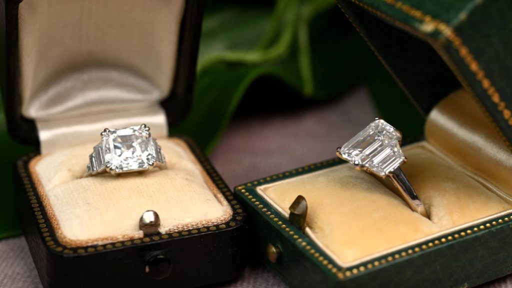 Asscher Cut Diamond Ring and Emerald Cut Diamond Ring in Boxes