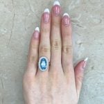 Elongated Aquamarine and Diamond Halo Ring Hand Picture Stinnett Ring f1 16029