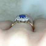 Prong-Set 0.70 carat round sapphire with diamond halo Basket View f3 16031