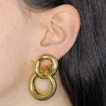 David Webb earrings featuring a door knocker design