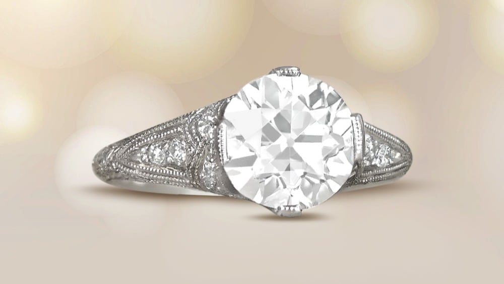 diamond ring set in platinum with engraved and decorated shanks