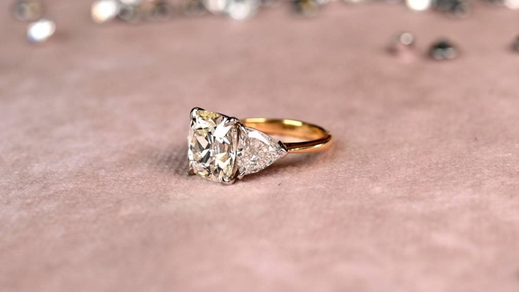 Cushion cut natural diamond engagement ring in gold