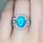 2.27 carat oval cut opal with diamond halo finger view f2 LV2420