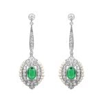 oval cut emerald stones surrounded by detailed design with diamonds and pearls Eldred Earrings OCT2501