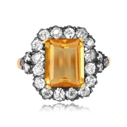 silver on yellow gold ring centering a 2.95 carat imperial topaz stone Beloit Ring OCT2533
