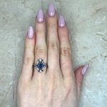 Oval-Cut Sapphire and Diamond Aimwell Ring Hand Picture f1 OCT2550