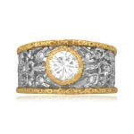 center 0.75 carat diamond set in a 2 tone gold design signed Buccellati ring 15818