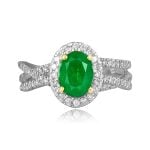 center 1.00 carat oval cut emerald stone with crossover design on shoulders Falerna Ring RKK3510638