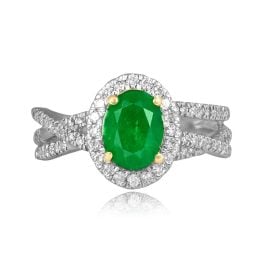 center 1.00 carat oval cut emerald stone with crossover design on shoulders Falerna Ring RKK3510638