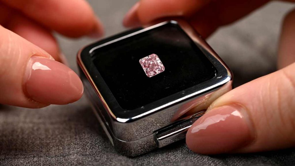 Half Carat Vivid red loose diamond in diamond box