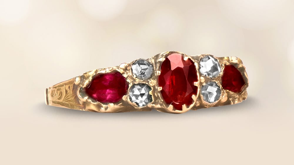 Georgian era ring with garnets and diamonds set in 15k yellow gold