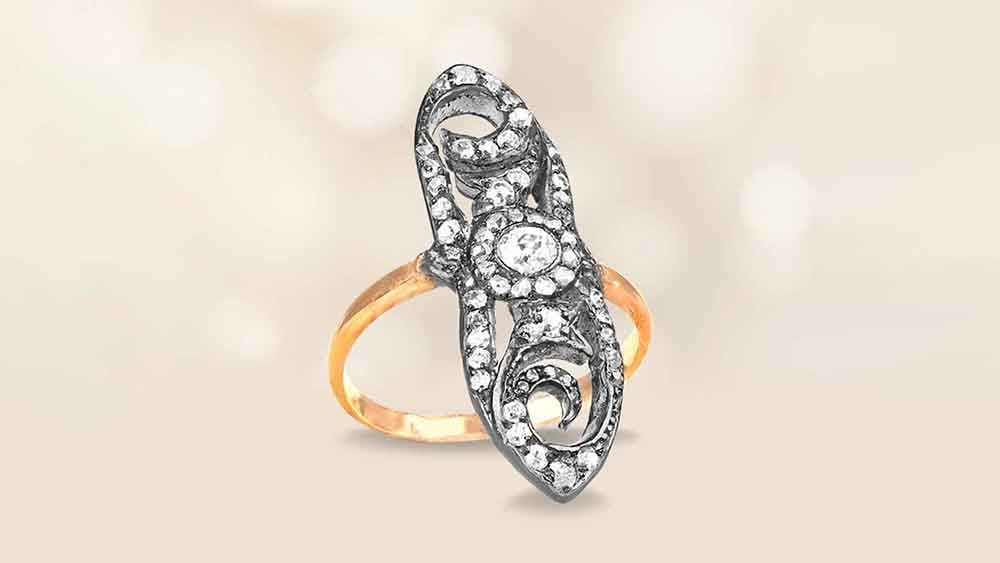 Navette ring with old mine cut diamonds on silver and 14k yellow gold