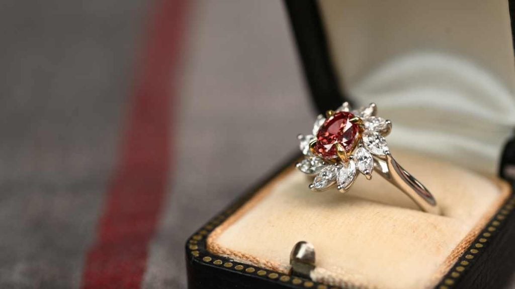 Vivid Red Colored Diamond in Halo Setting Ring