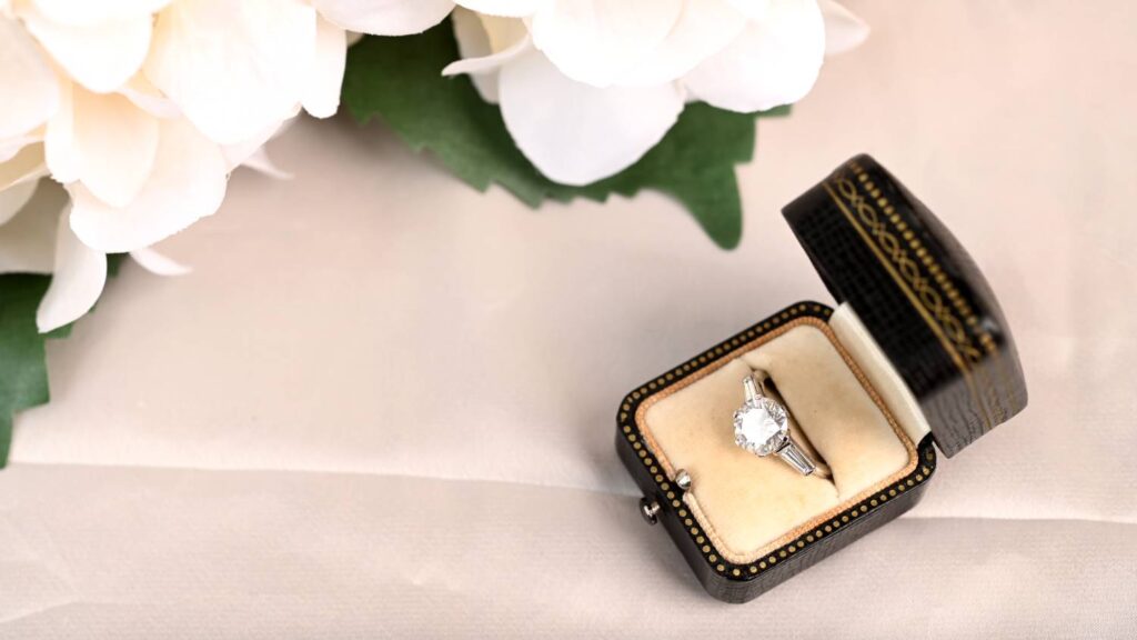 Engagement Ring in Box with Flowers Top View Above